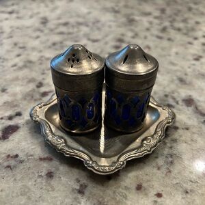 Vintage silver plated salt and pepper shakers with tray